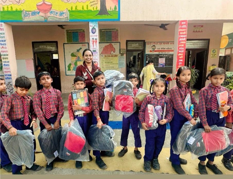 School children holding their new school bags
