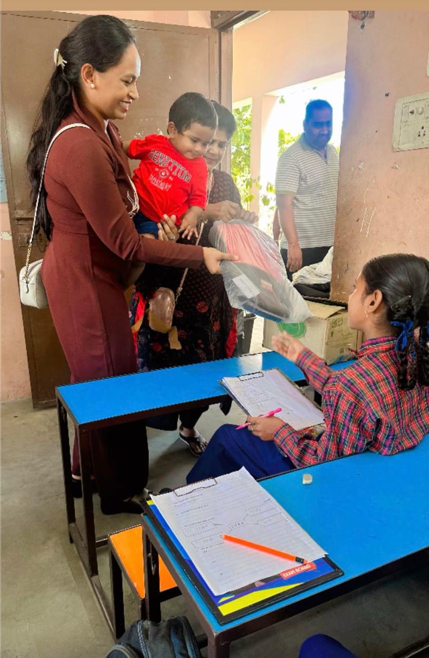 A school bag being handed over at a school desk